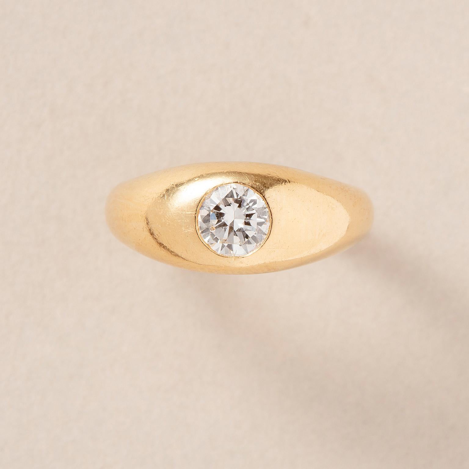 An 18k Gold Cartier Ring with a Flush set Solitair Diamond For Sale 3