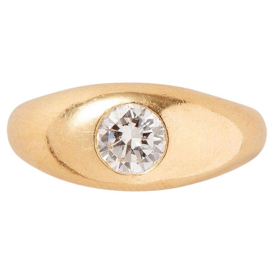 Anillo Cartier de oro de 18 quilates con un diamante solitario engarzado a ras