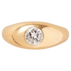 Anillo Cartier de oro de 18 quilates con un diamante solitario engarzado a ras