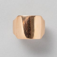 An 18K Gold Cartier Santos Ring