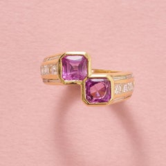 An 18k Gold Diamond and Pink Sapphire Toi et Moi Ring