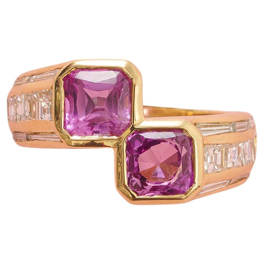 An 18k Gold Diamond and Pink Sapphire Toi et Moi Ring