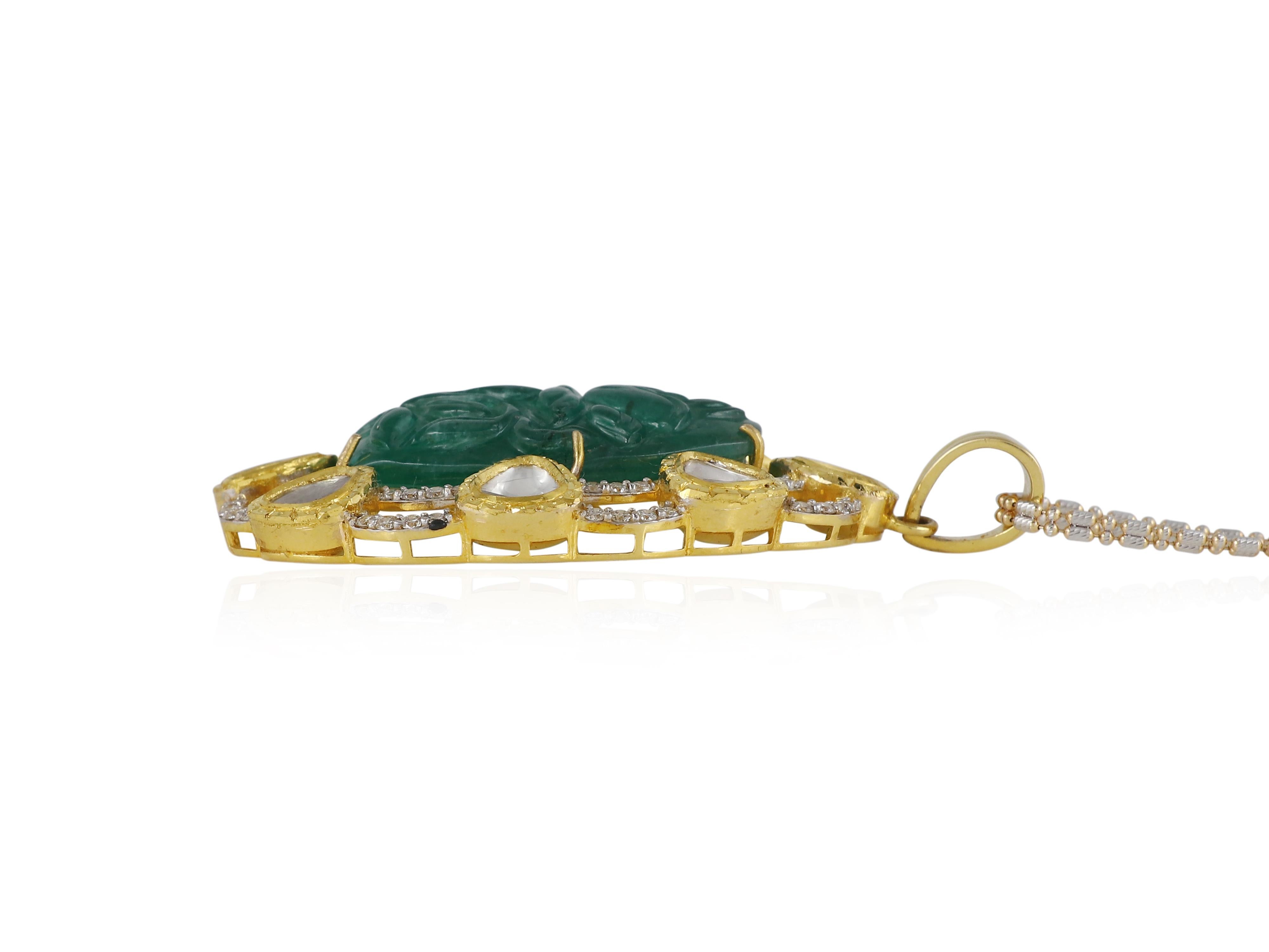 Uncut An 18K gold emerald carving pendant set with natural full cut and uncut diamonds For Sale