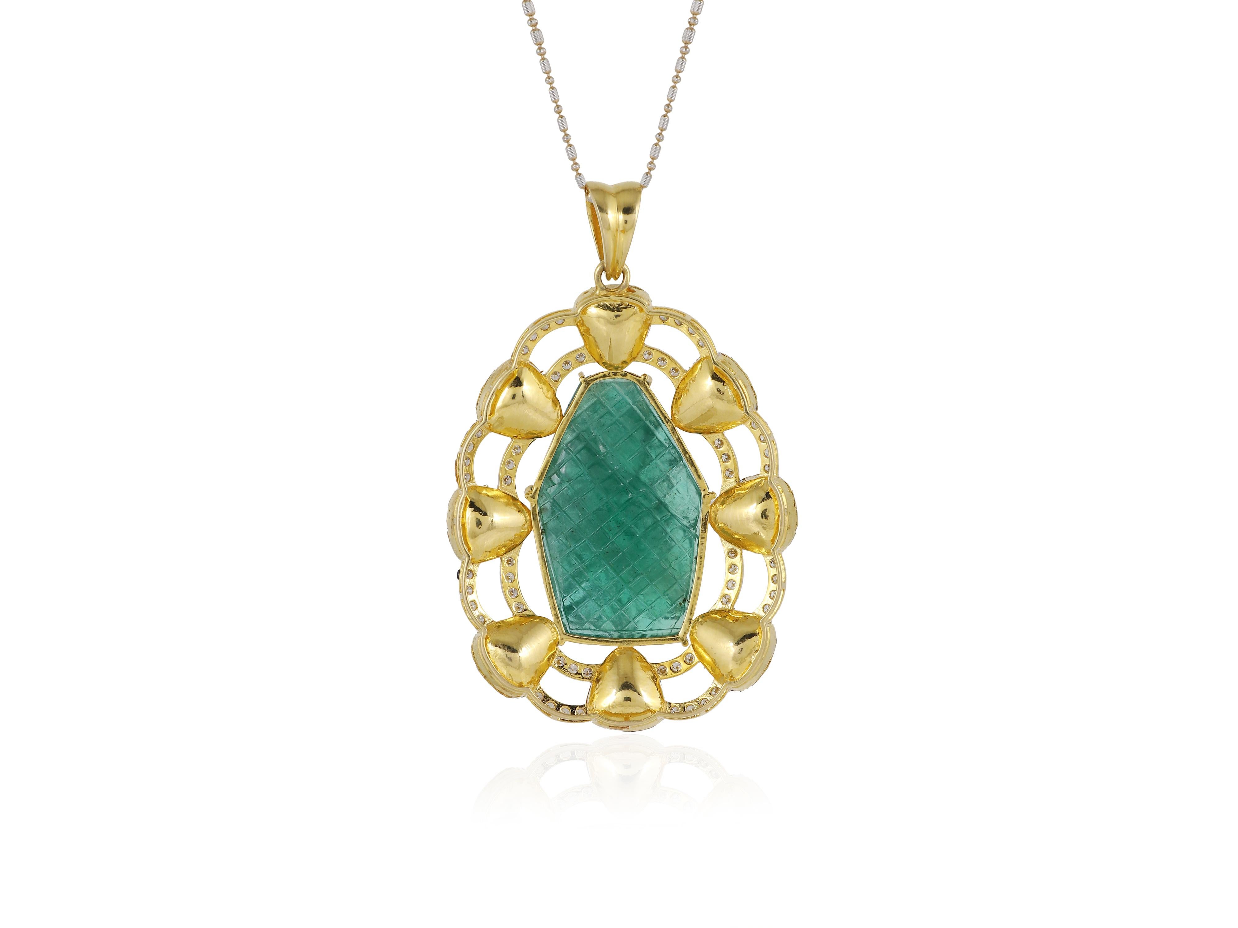 An 18K gold emerald carving pendant set with natural full cut and uncut diamonds For Sale 3