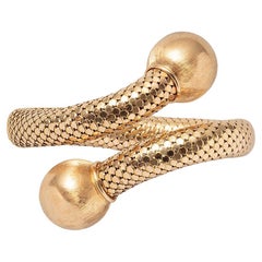An 18k Gold Flexible Massela Bangle