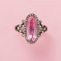 An 18k Gold French Ring with Pink Topaz and Diamond