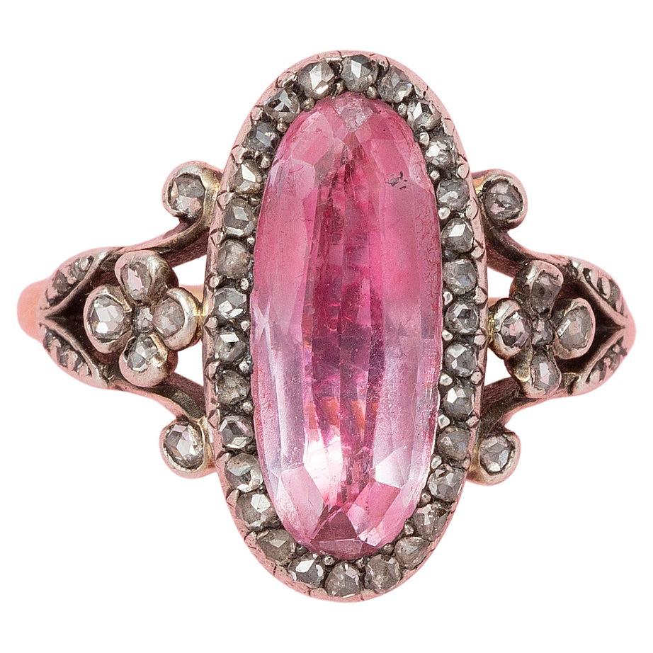 An 18k Gold French Ring with Pink Topaz and Diamond