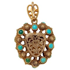 An 18k gold Georgian heart vinaigrette locket with turquoise