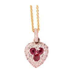 An 18k Gold Heart Locket with Diamond and Ruby