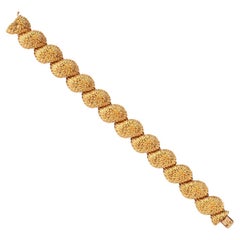 Un bracelet Herisson Van Cleef & Arpels en or 18 carats
