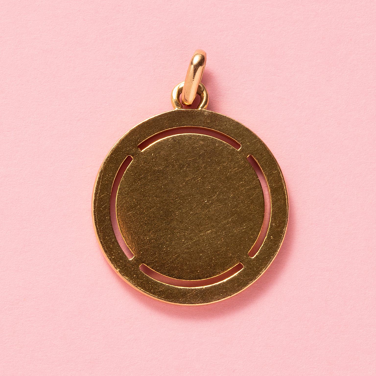 Baguette Cut An 18k Gold Love Pendant with Rubies and Diamonds For Sale