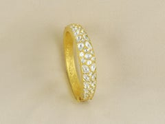 An 18K gold natural diamond polkis bangle  Indian heritage jewellery
