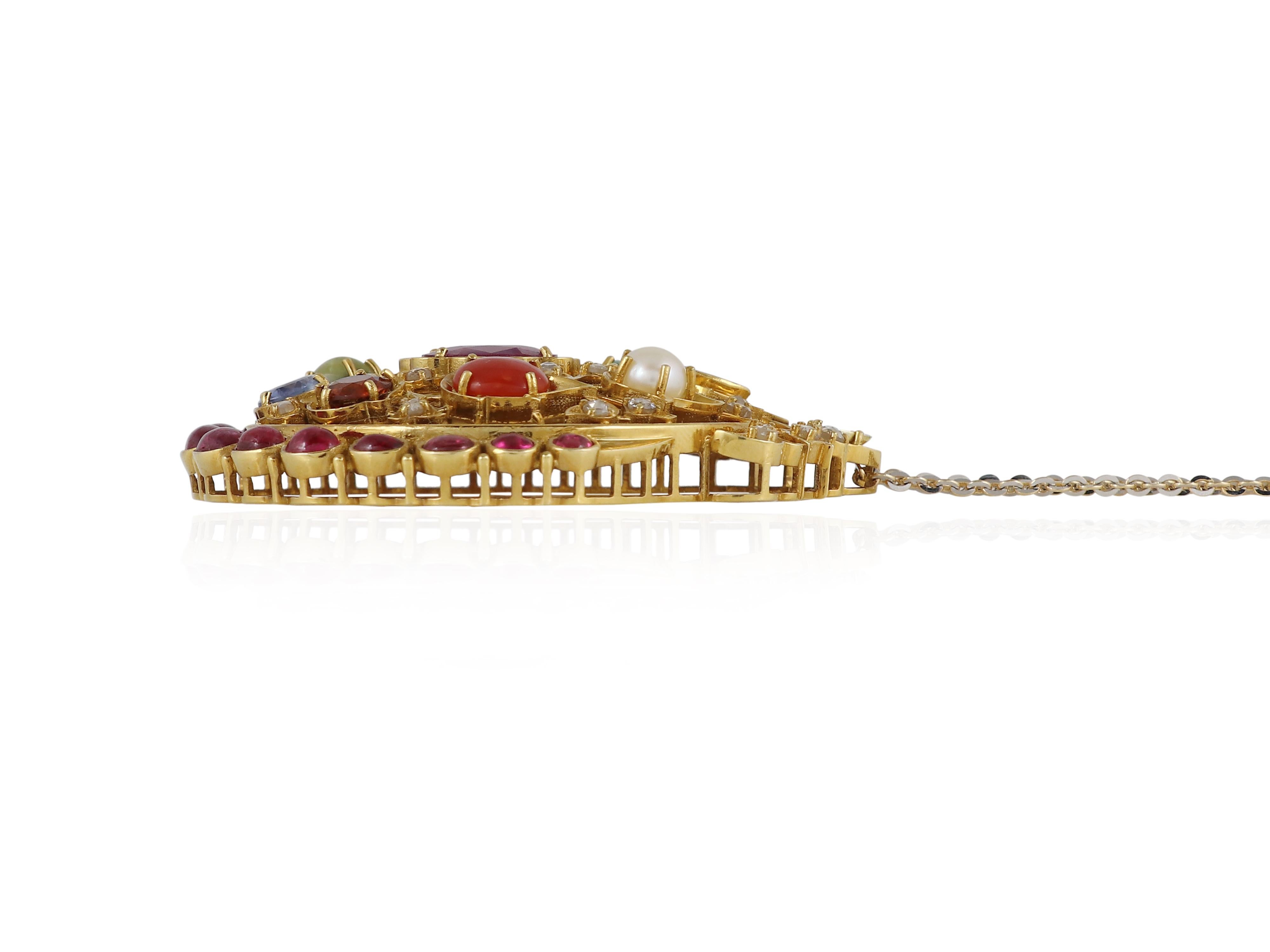 Women's An 18K gold Navratna pendant set with nine natural gemstones with diamond For Sale