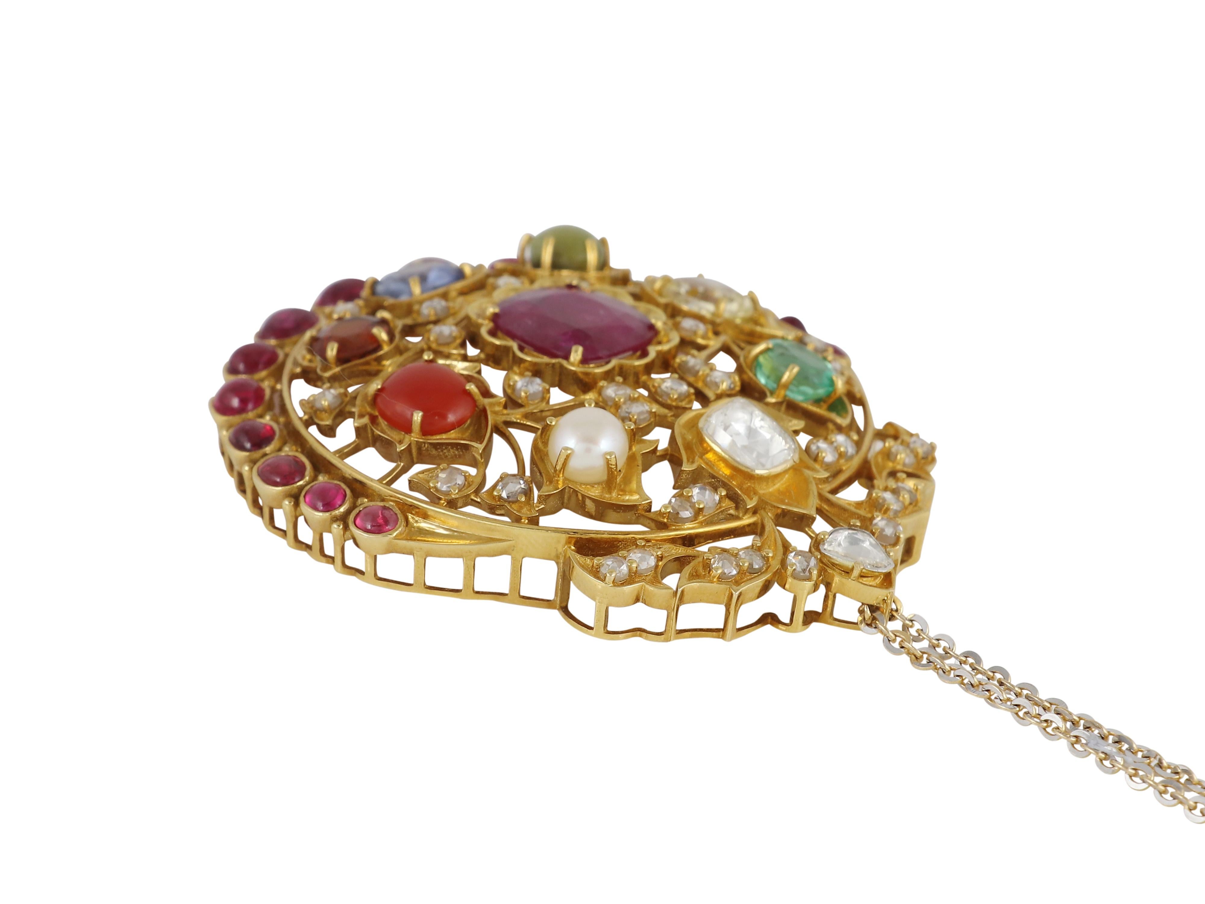 An 18K gold Navratna pendant set with nine natural gemstones with diamond For Sale 1