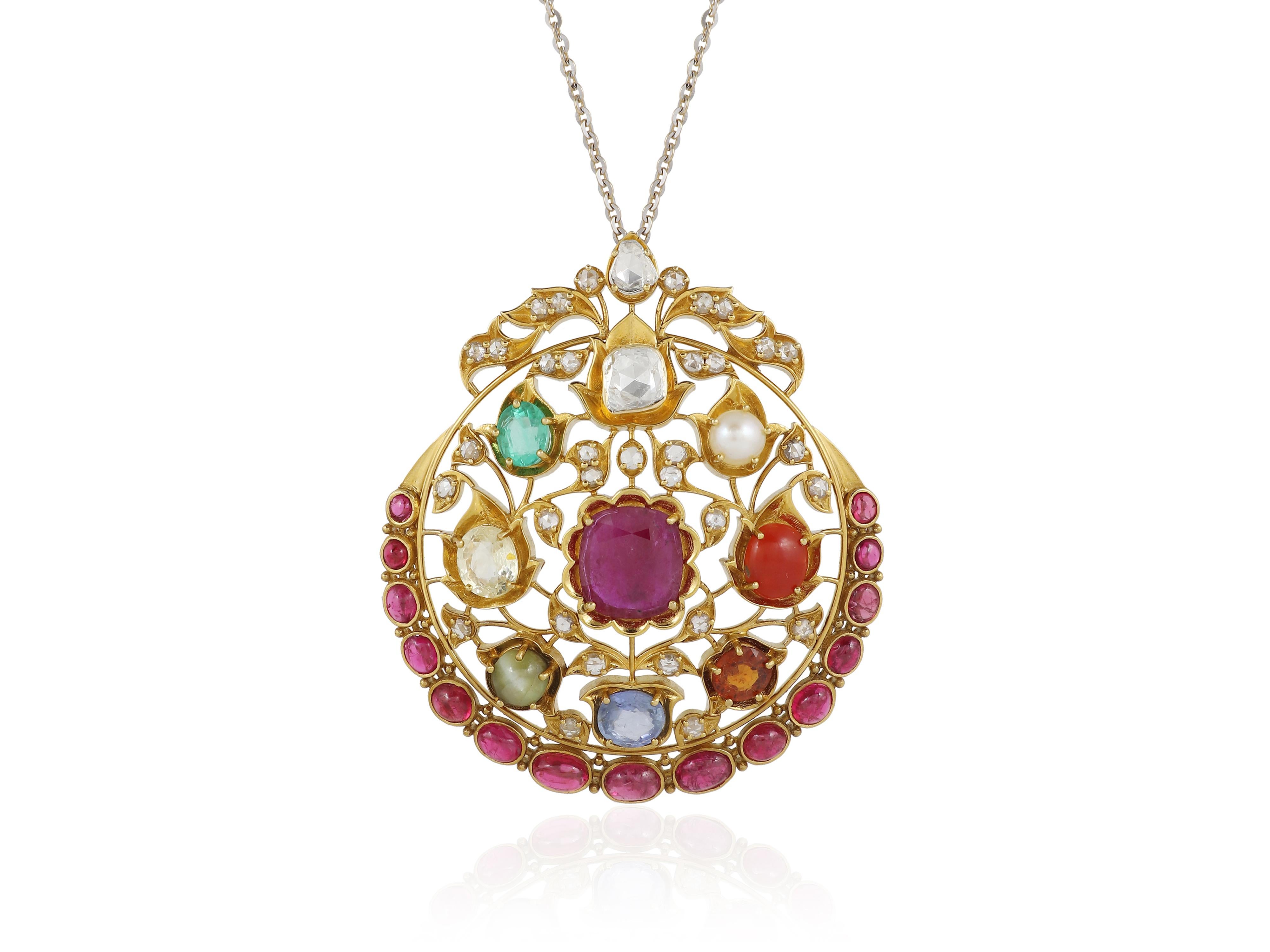 An 18K gold Navratna pendant set with nine natural gemstones with diamond For Sale 3