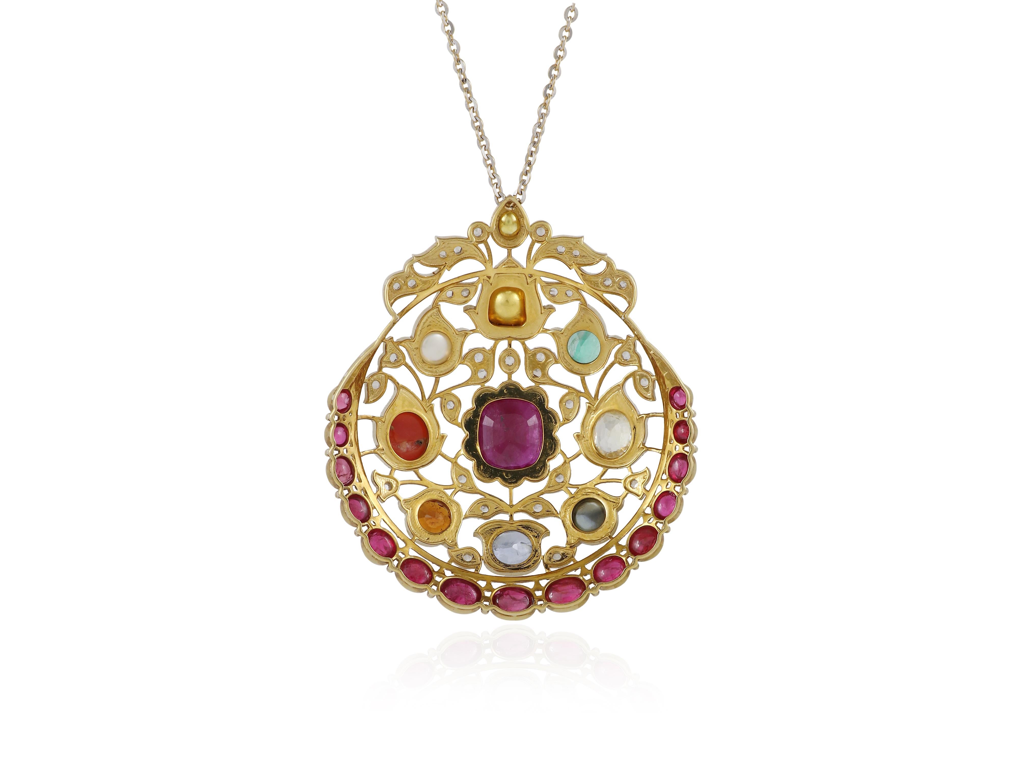 An 18K gold Navratna pendant set with nine natural gemstones with diamond For Sale 4