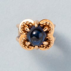 An 18k Gold Talon Ring with Sapphire