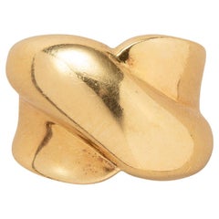 An 18k Gold Wide Band Ring
