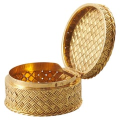 Eine 18k Gold gewebte Hermes Box