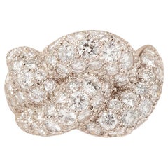 An 18k White Gold Braided Knot Ring with Diamonds