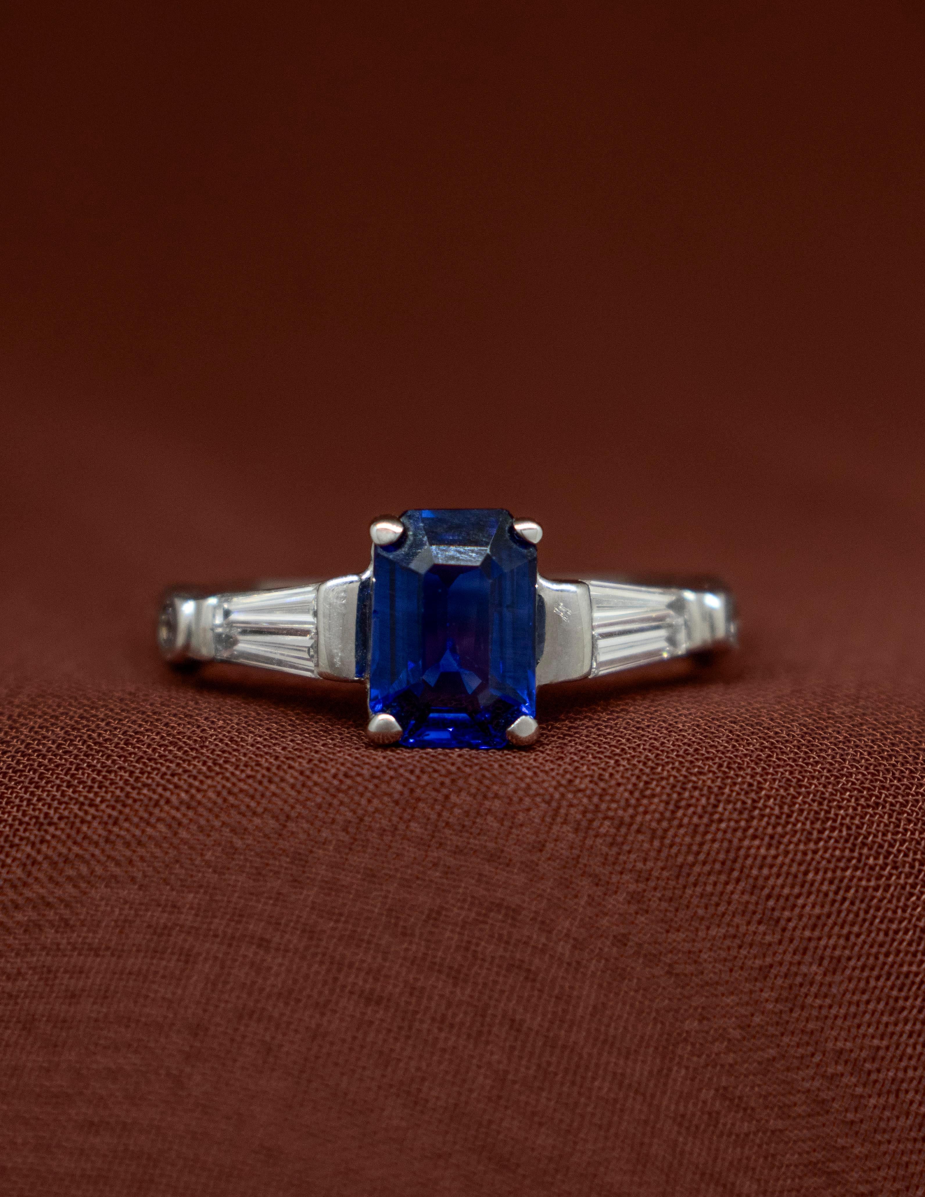 Emerald Cut An 18k White Gold Ring with Blue Sapphire and Baguette Diamonds For Sale