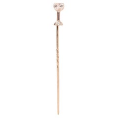 An 18k White Gold Wine Glass Stick Pin with Diamonds