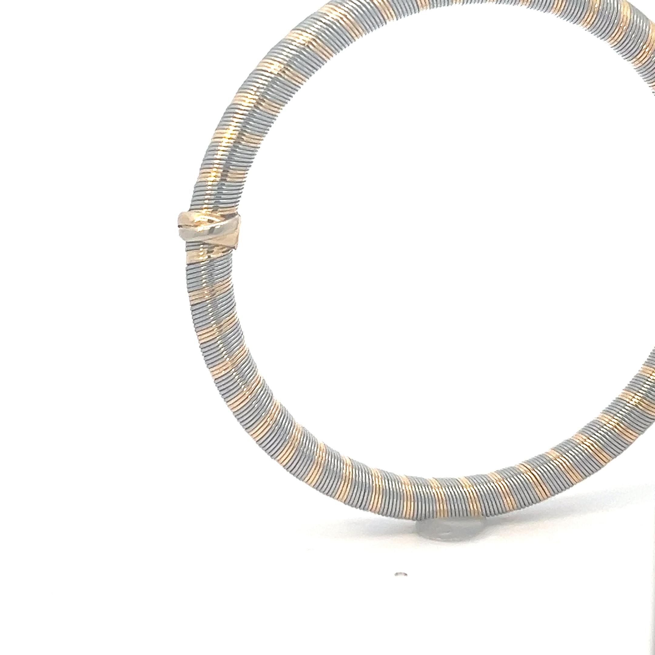 Ein Armreif aus 18 Karat Gelbgold und „acier“ von Cartier. im Zustand „Gut“ im Angebot in KERKRADE, NL