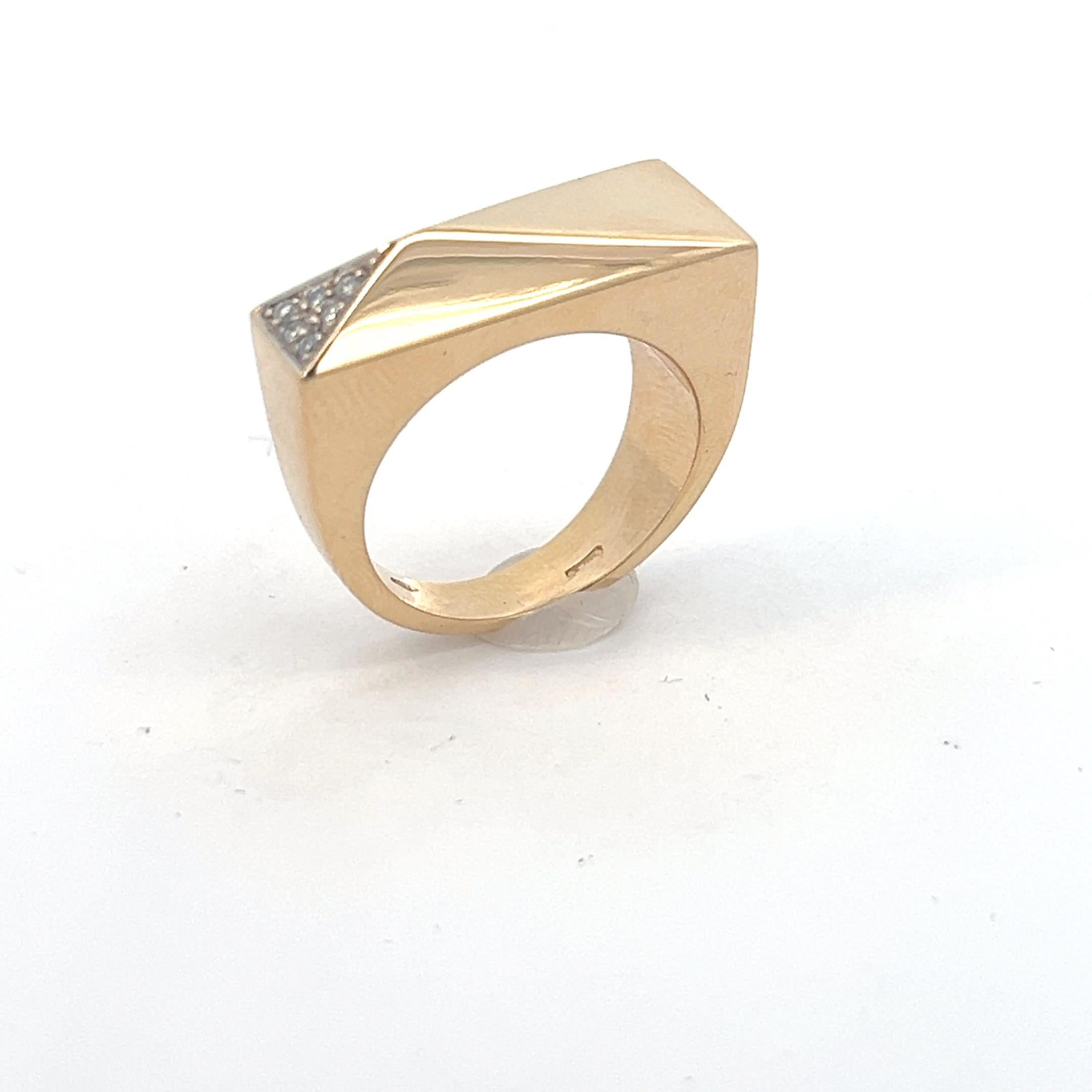 An 18k yellow gold and diamond ring by Versace.

Total diamond weight: circa 0.06ct, graded while in setting.

Origin: Varese, Italy.
Age: circa 1990.
Ring size: 51.5. We advise against resizing this ring.
Weight: circa 10.7 grams.
Hallmarks: Marked
