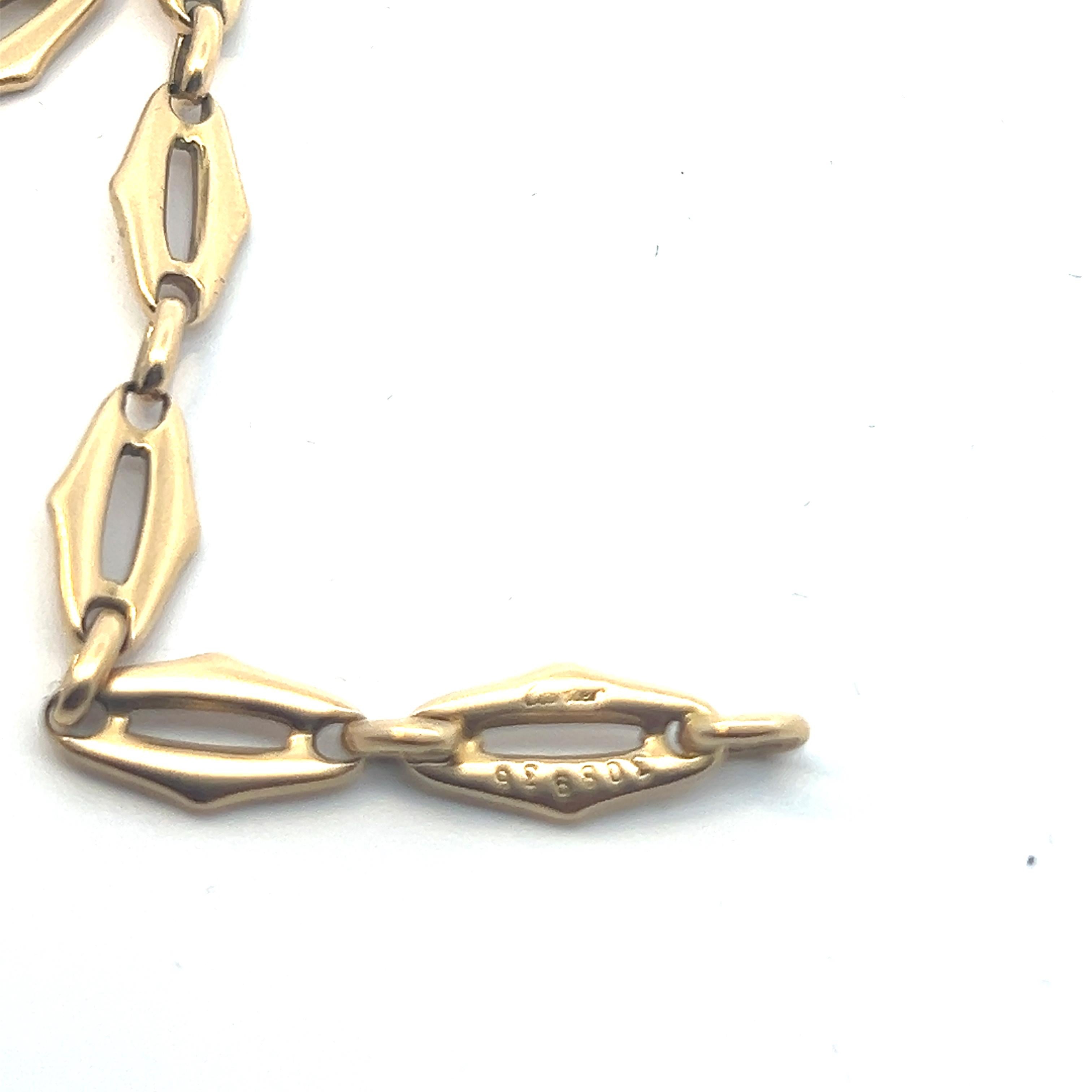 An 18k yellow gold bracelet by Cartier. 6