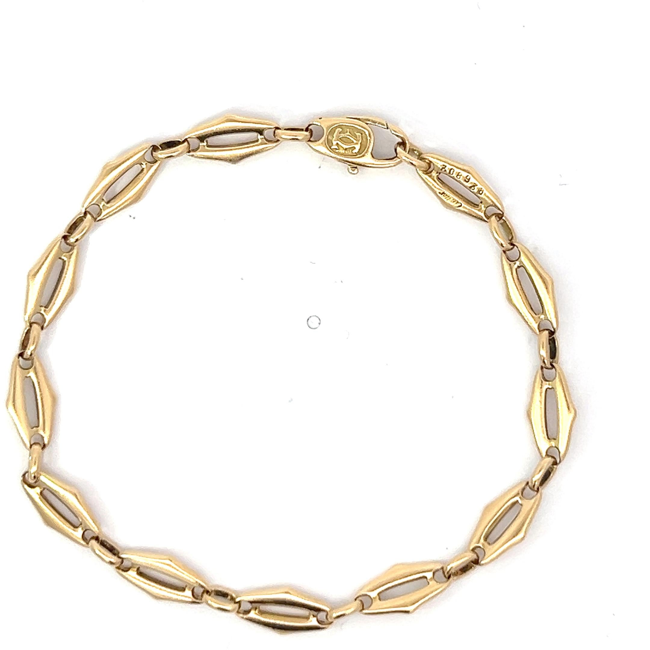 Women's or Men's An 18k yellow gold bracelet by Cartier.