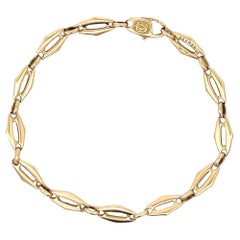 An 18k yellow gold bracelet by Cartier.