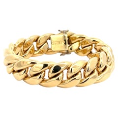 Un bracelet en or jaune 18 carats de Nicolis Cola.