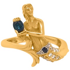 18 Karat Yellow Gold, Diamond and Sapphire Mermaid Motif Ring, Carrera y Carrera