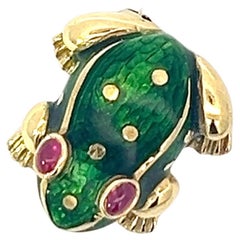An 18k yellow gold, enamel and ruby frog brooch by Nardi