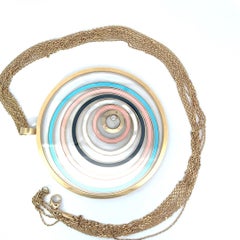 An 18k yellow gold "Happy Spirit" pendant and long chain by Chopard