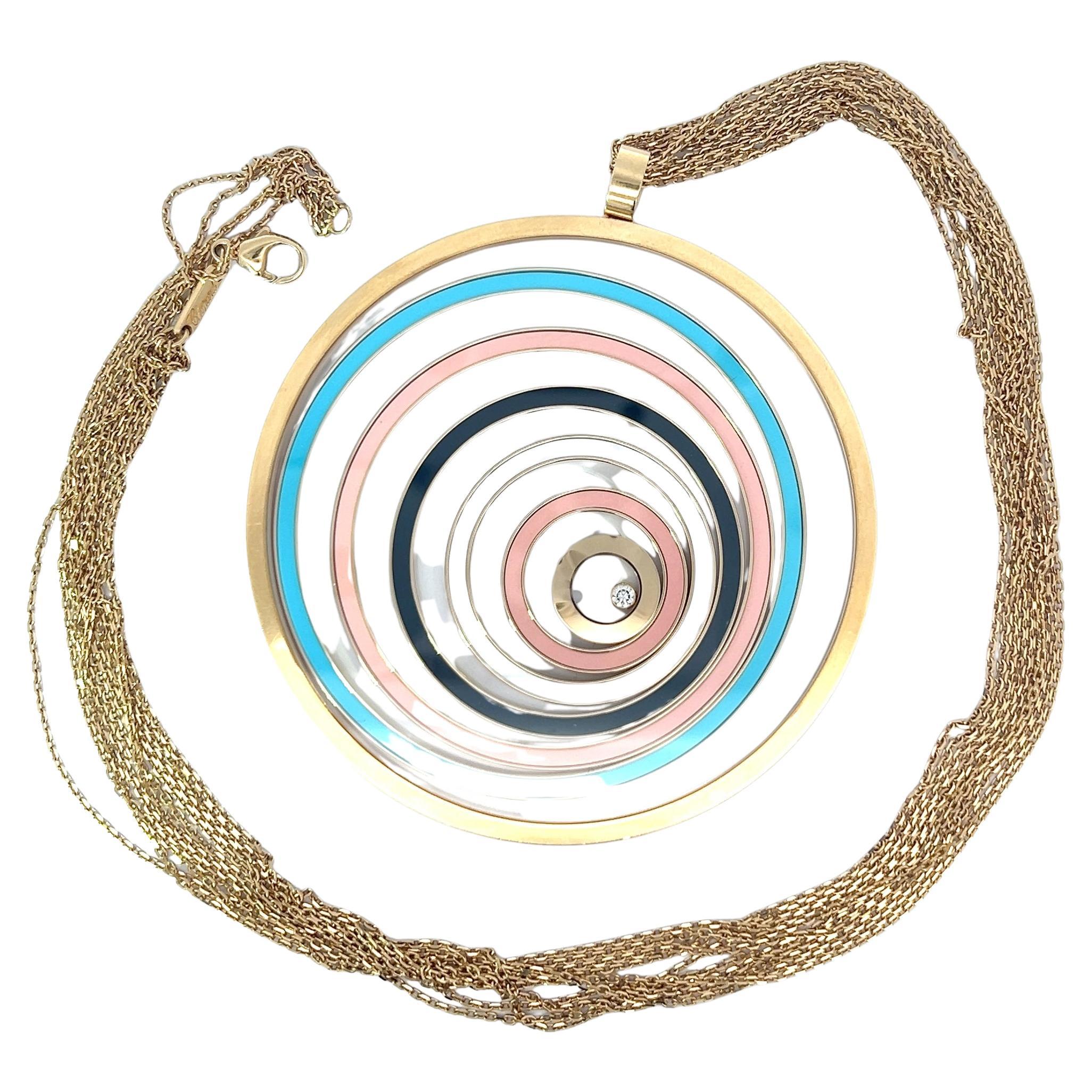 An 18k yellow gold "Happy Spirit" pendant and long chain by Chopard