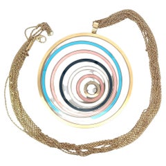 An 18k yellow gold "Happy Spirit" pendant and long chain by Chopard