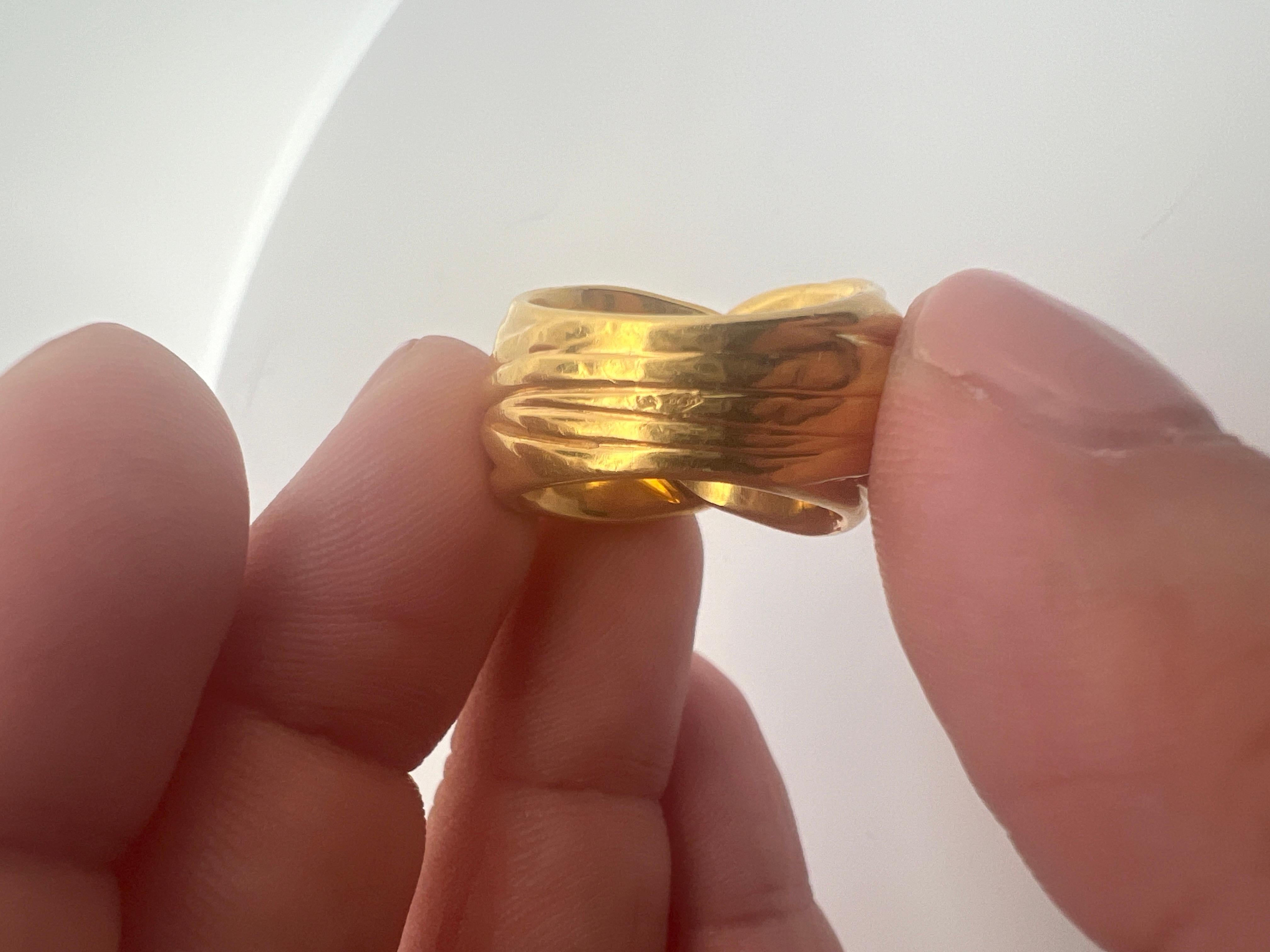 An 18k yellow gold ring by Yves Saint Laurent. 7
