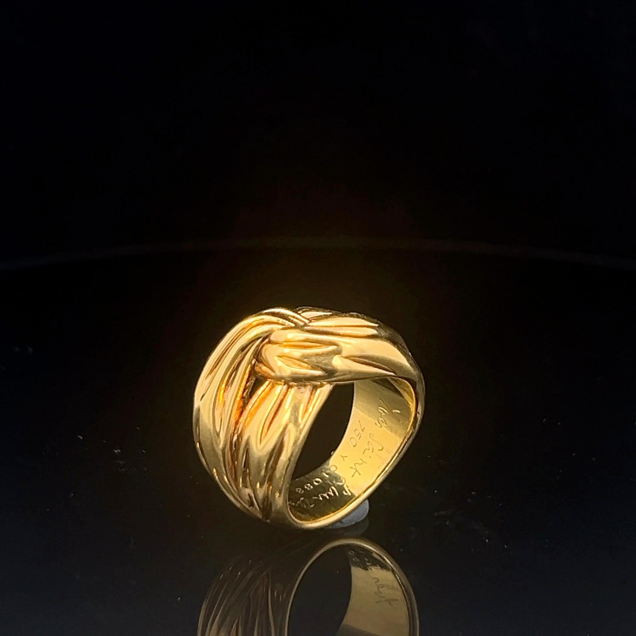 An 18k yellow gold ring by Yves Saint Laurent. 10