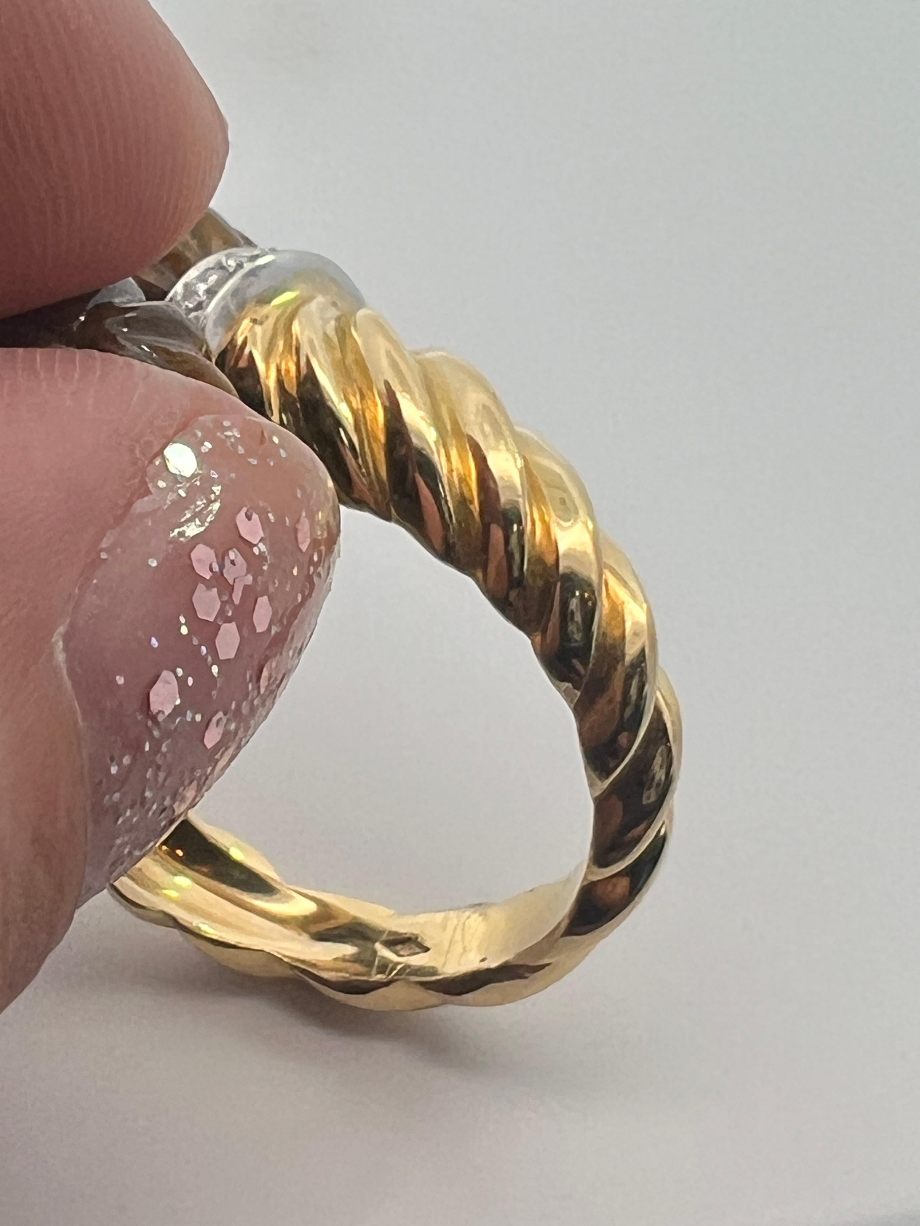 An 18k yellow gold, Tiger's Eye Quartz and diamond ring by Chaumet 1