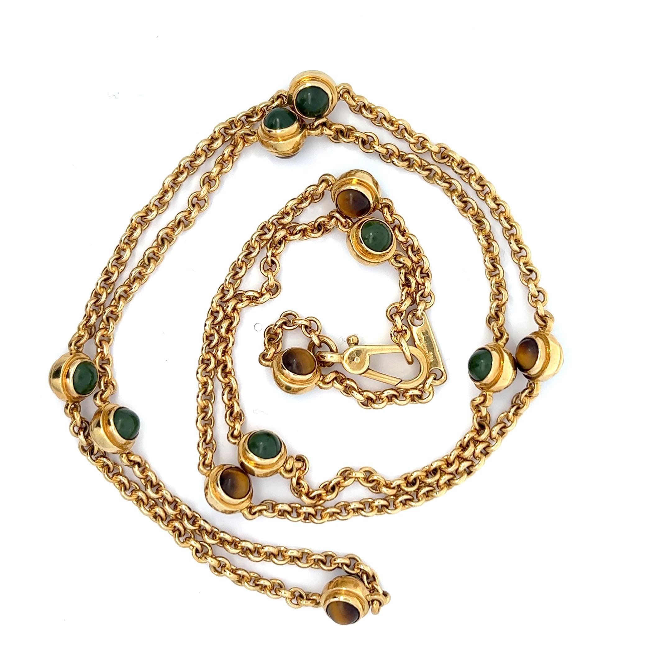 Catena lunga in oro giallo 18k, quarzo occhio di tigre e nefrite (giada) di Pomellato.

Origine: Milano, Italia.
Età: circa 1970.
Misure: Lunghezza circa 87 cm.
Peso: circa 82,9 grammi.
Punzoni: Marchio di fabbrica italiano di Pomellato in