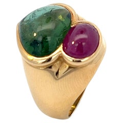 An 18k yellow gold, Tourmaline and Ruby ring
