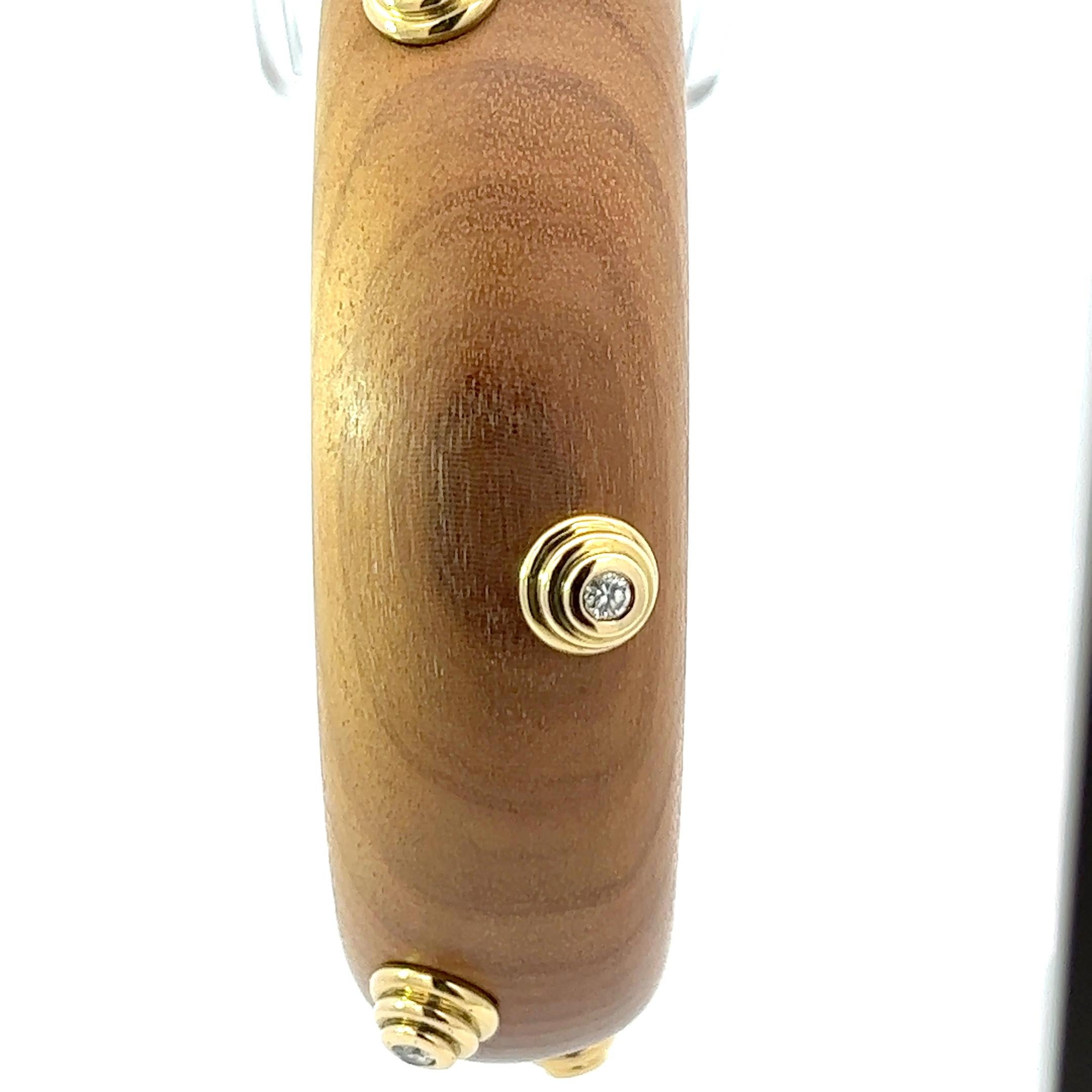 An 18k yellow gold, Wood and Diamond bangle by Christian Dior. In Good Condition For Sale In KERKRADE, NL