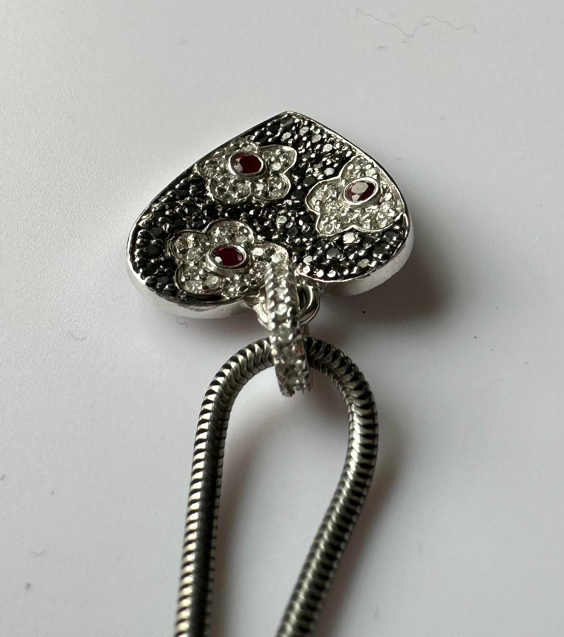 An 18kt White Gold Heart Shaped Pendant set with Rubies & Diamonds. For Sale 4