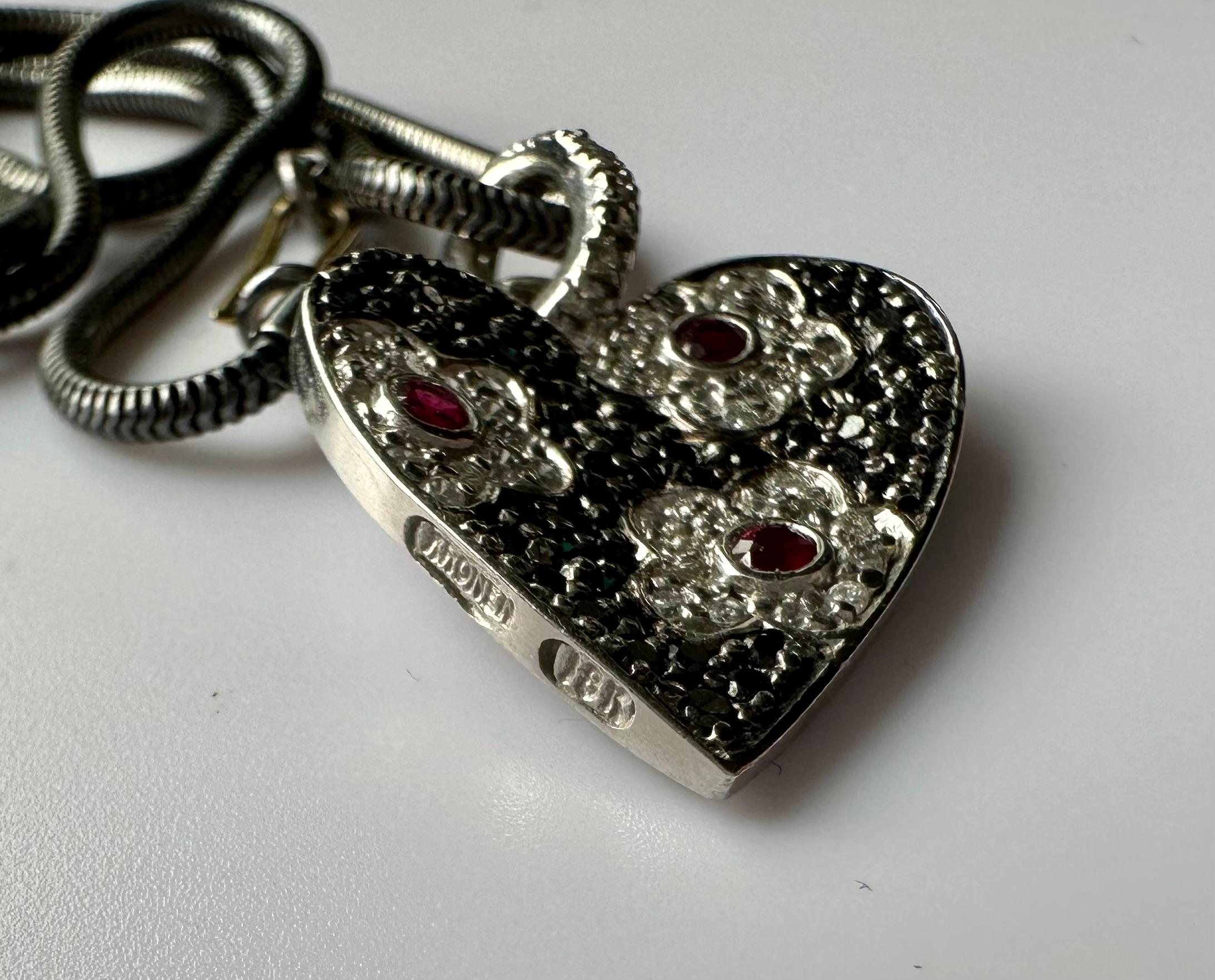 An 18kt White Gold Heart Shaped Pendant set with Rubies & Diamonds. For Sale 6