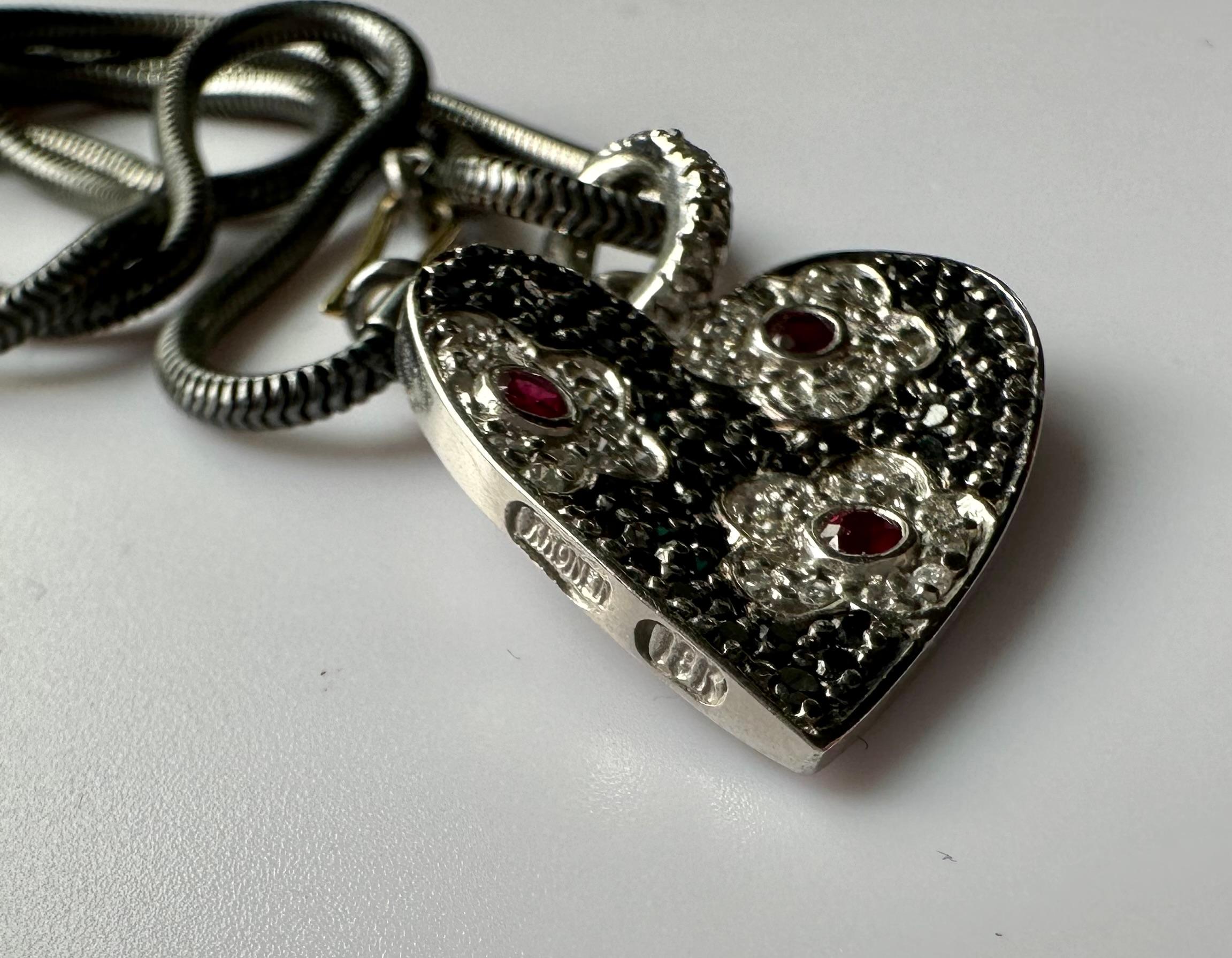An 18kt White Gold Heart Shaped Pendant set with Rubies & Diamonds. For Sale 7