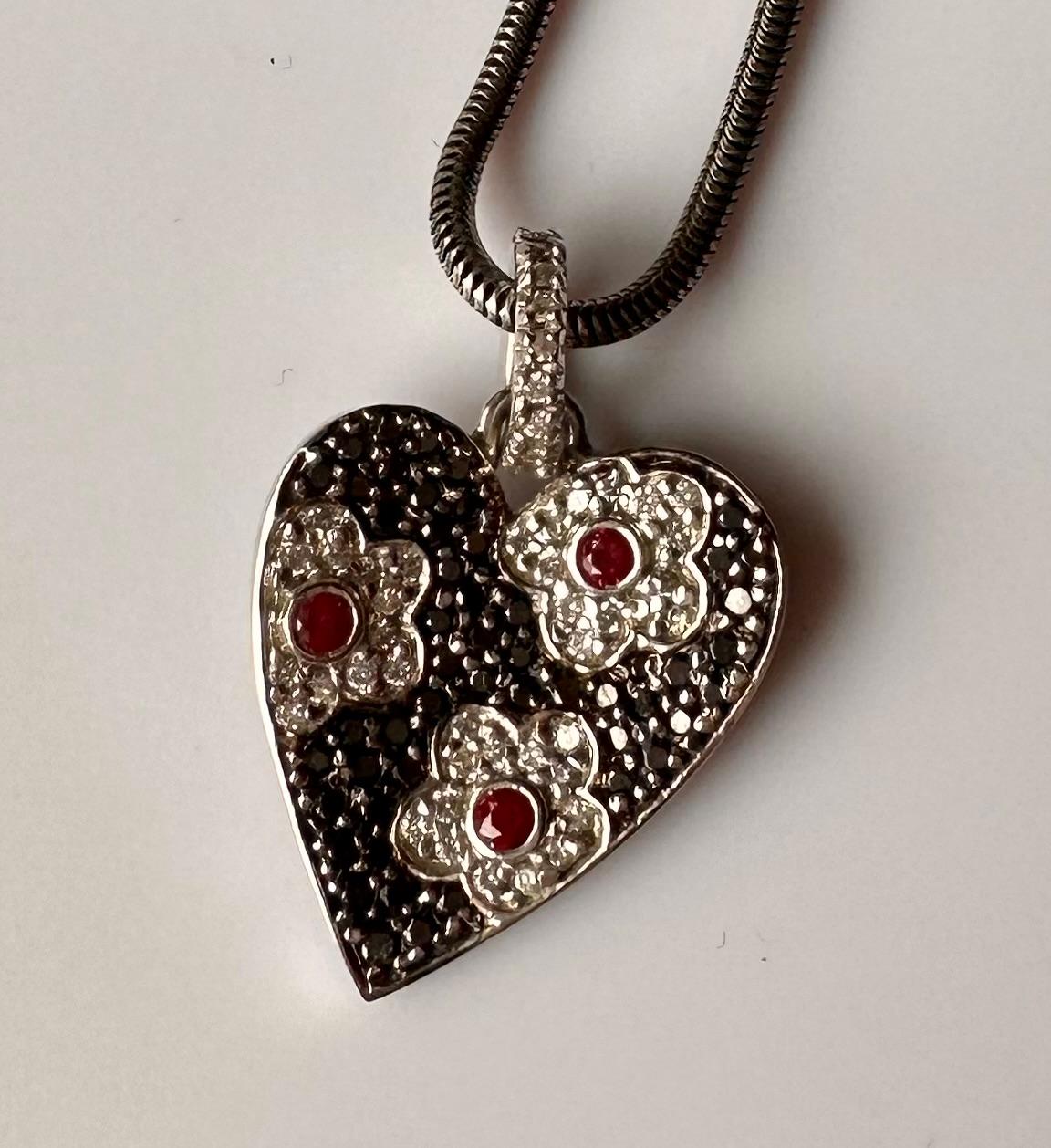 Women's or Men's An 18kt White Gold Heart Shaped Pendant set with Rubies & Diamonds. For Sale