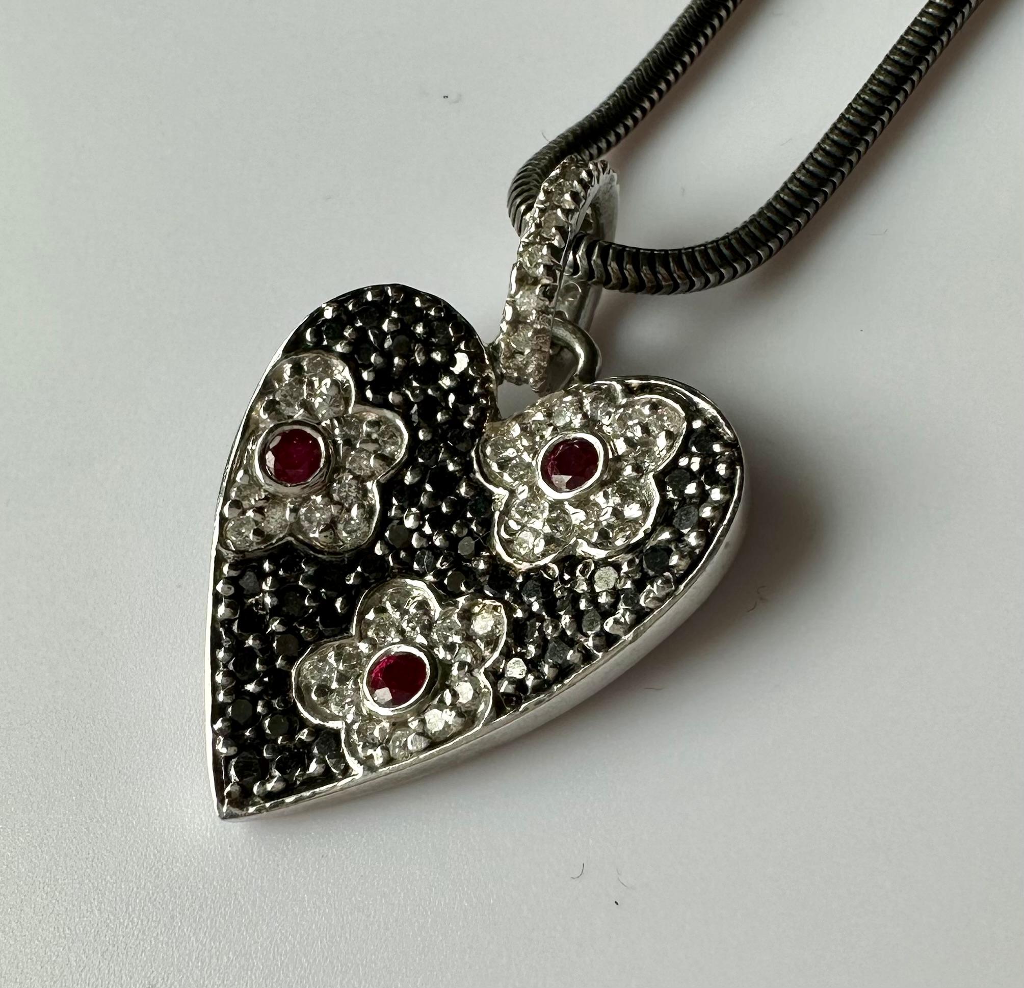 An 18kt White Gold Heart Shaped Pendant set with Rubies & Diamonds. For Sale 1