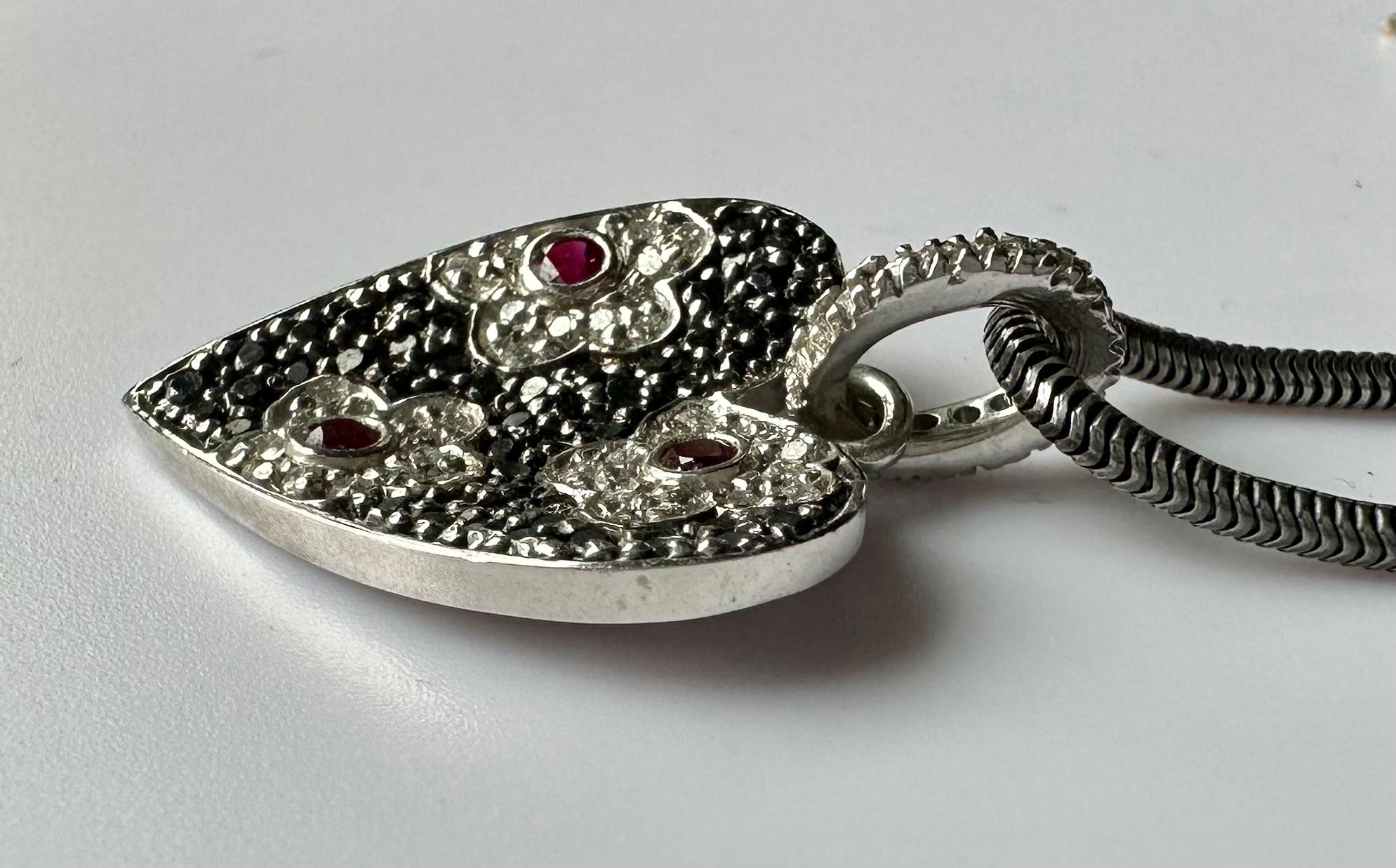 An 18kt White Gold Heart Shaped Pendant set with Rubies & Diamonds. For Sale 3