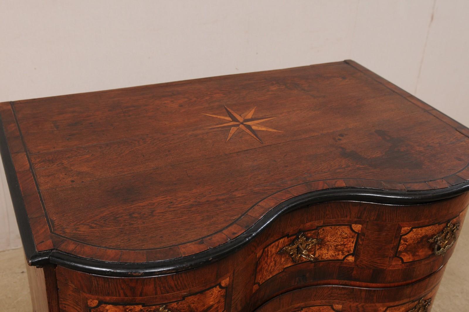 Chestnut 18th Century Italian Curvy Serpentine Chest with Exceptional Marquetry and Inlay For Sale